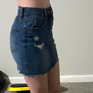 Ripped jean mini skirt